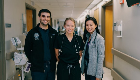 Three young mental health professionals in a VA facility.